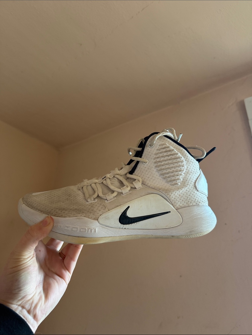 Nike White High-Top Sneaker with Black Swoosh Accents